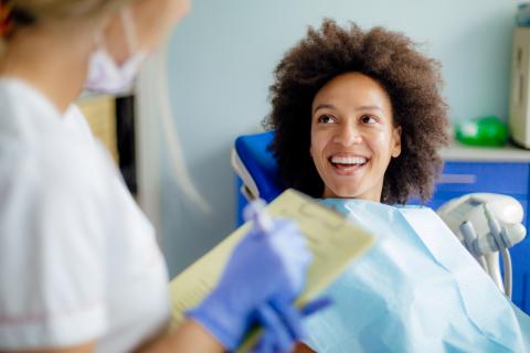 female patient with dental hygienist 