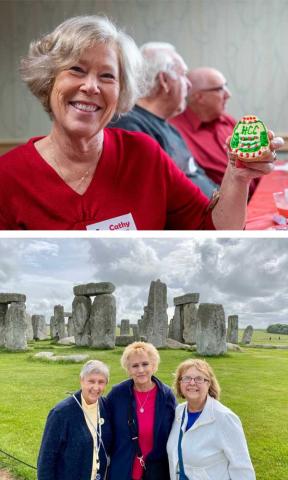 HCC Alumni Members standing in front of stonehenge, and an alumni member holding up a cookie