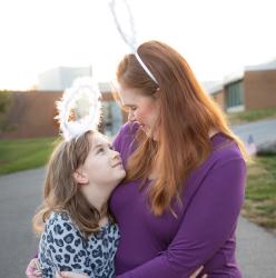 Radiography student, Katy Smith, holding her daughter